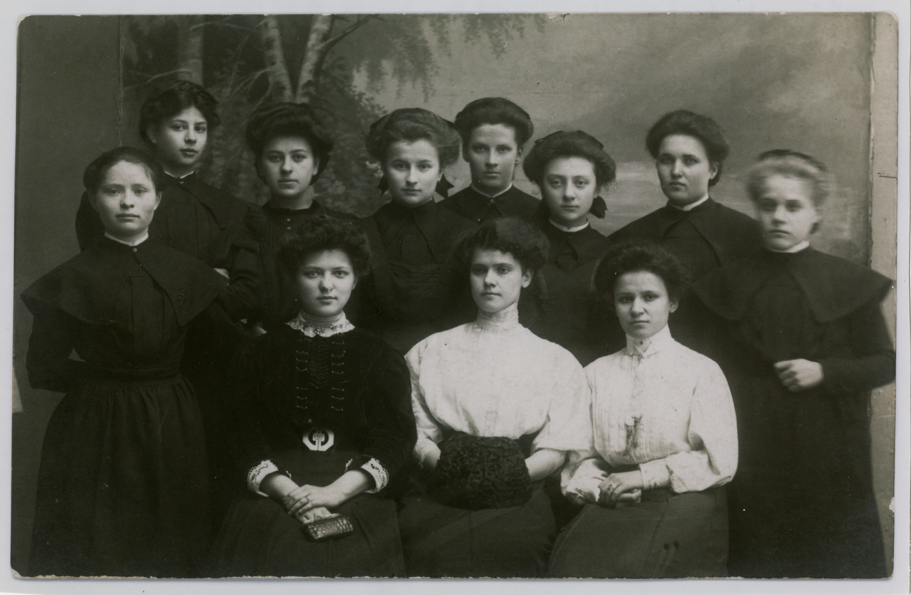 Group portrait of young women in the school for the deaf in Warsaw.

Rebecca Jaglom (Wajcblum) is standing third from the left.