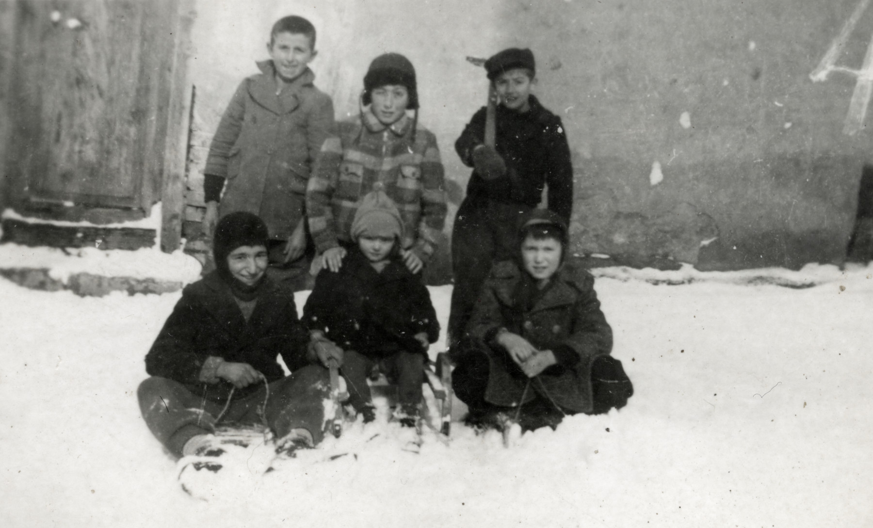 Raul Teitelbaum and his friends play in the snow.

Raul is in the second row, center.