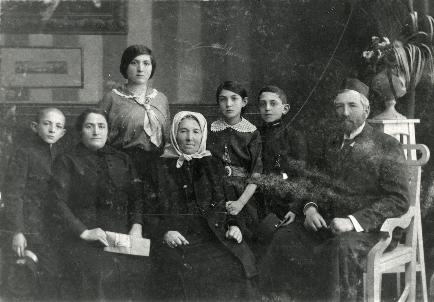 Studio portrait of the Weiselberg family.

After the father Nahum Weiselberg died in a typhus epidemic, his wife Ettel moved to Vienna.  Two children, Salo and Sala immigrated to Palestine.  Another son David became a doctor and immigrated to America.  The second daughter Paula is the mother of the donor.  The grandmother Ettel was deported to Theresienstadt and perished in the Holocaust.