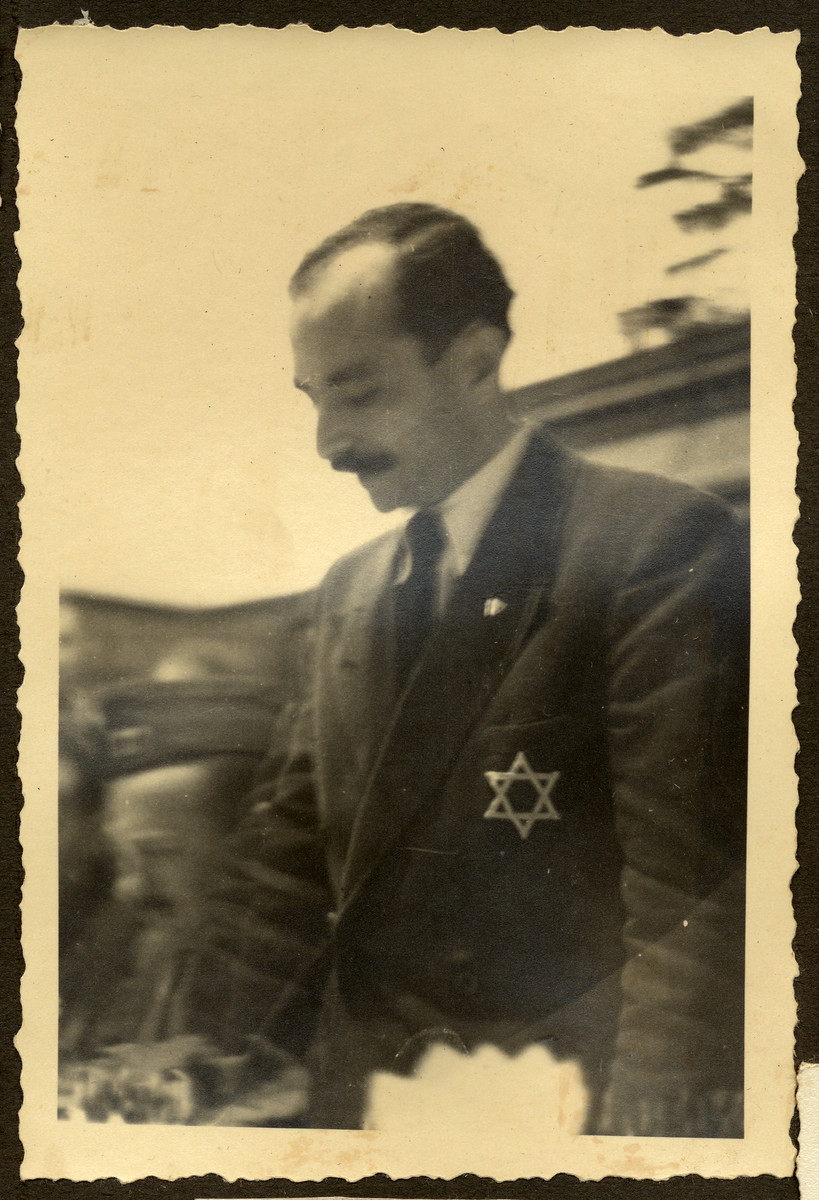 Dr. Greenberg, the leader of the Feldafing displaced persons' camp, speaks at a public gathering.