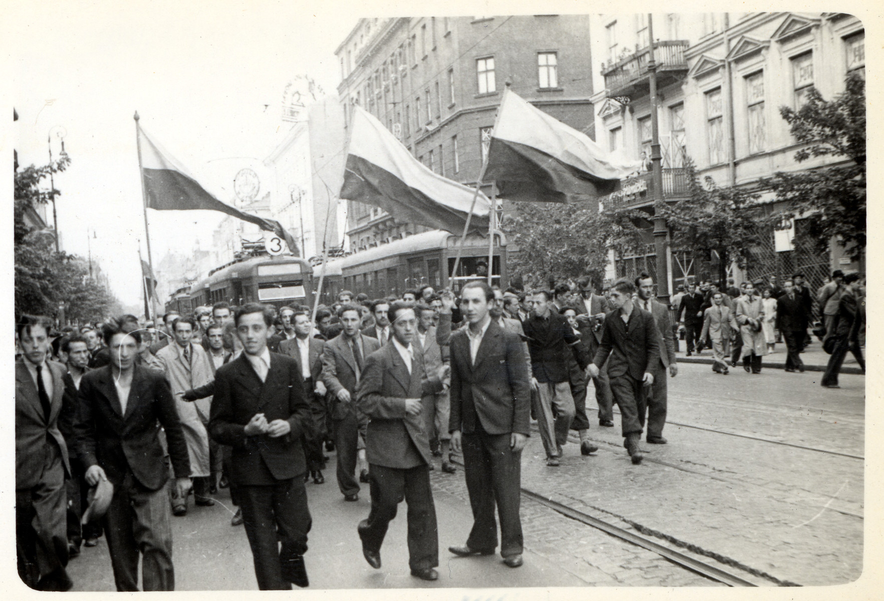 "A Moment of Confidence:" Poles celebrate in the streets at the news that England and France declared war on Germany. 

[The book "Warsaw" by Julien Bryan states that this photograph was taken on September 3, 1939 but Mr. Bryan himself did not arrive in Warsaw until the 7th of that month. This information does not match up, thus the tentative date.]