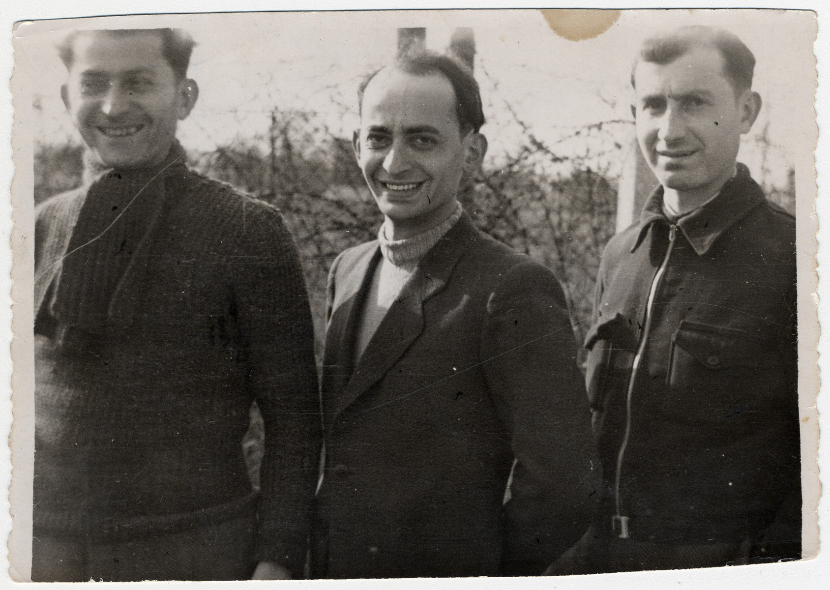 Close-up portrait of three Jewish men in the Beuane-La-Rolande internment camp.

Pictured are Chil Sztal, Jankiel Michalowiciz and Moishe Sztal.

The original caption reads: To my dear brother in law and sister in law and our dear cousins.  We are sending you this photograph as a remembrance of our time in the Camp Beaune-la-Roland.  Passover 1942.