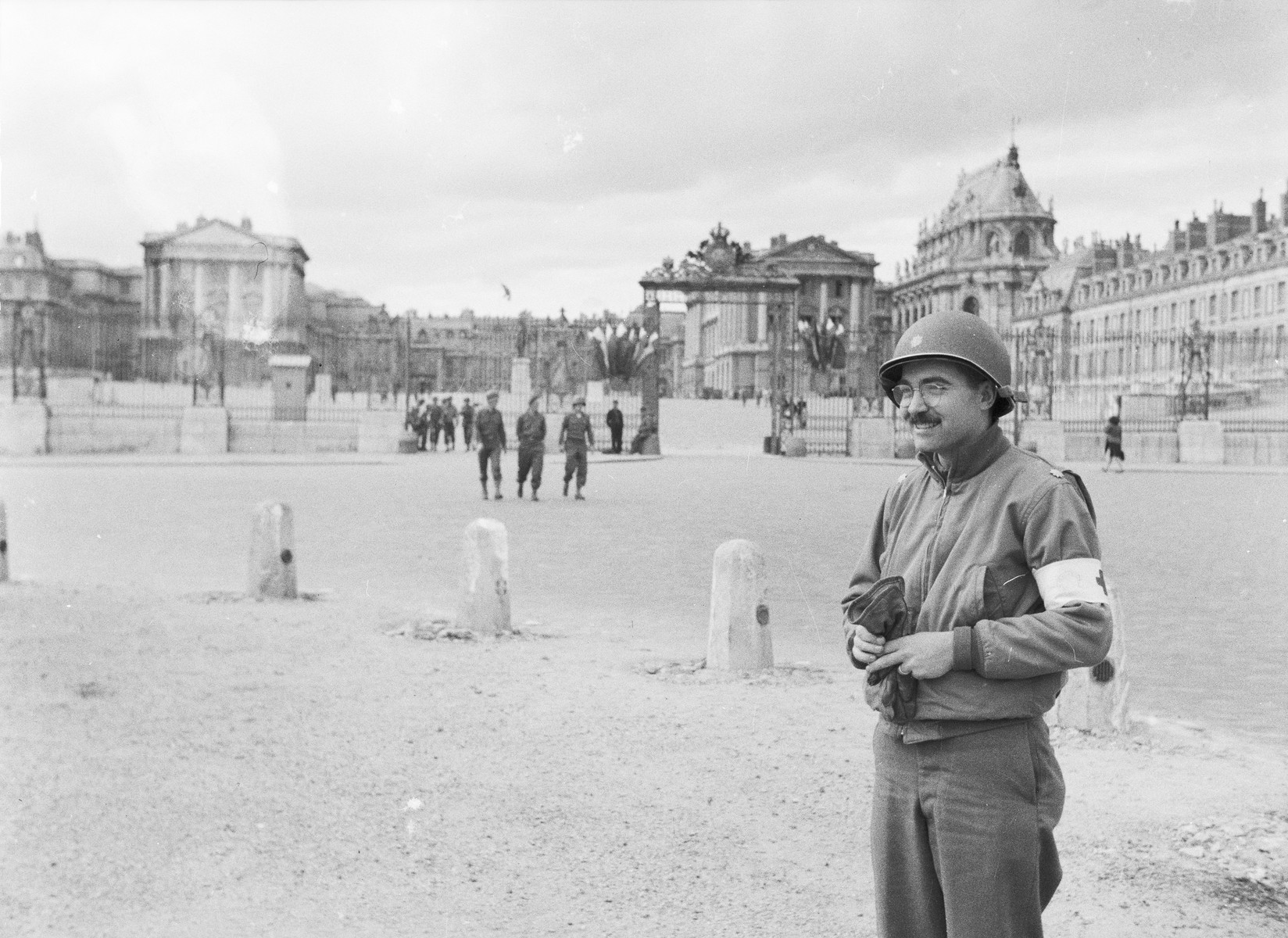 Dr. William G. Birch stands in a city square in Germany.