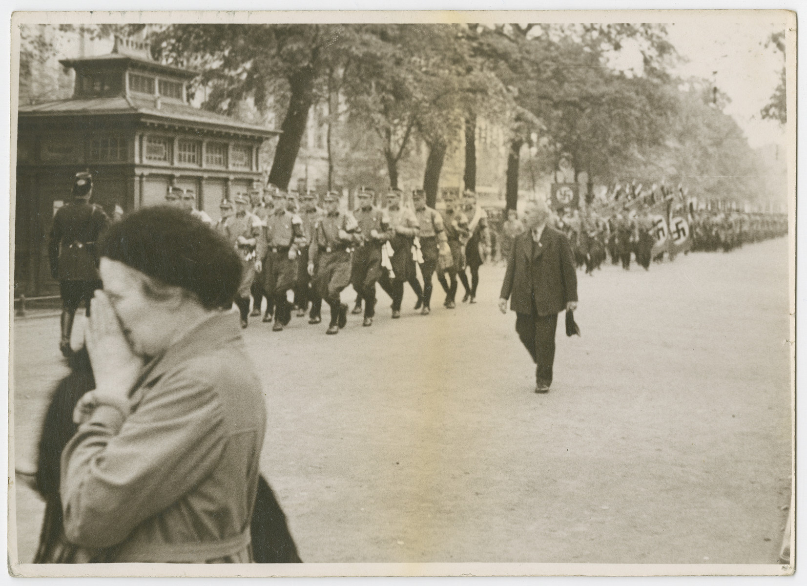 SA troops march down a street in Germany.

Photograph is used on page 64 of Robert Gessner's "Some of My Best Friends are Jews."  The pencil inscription on the back of the photograph reads, "Germany."