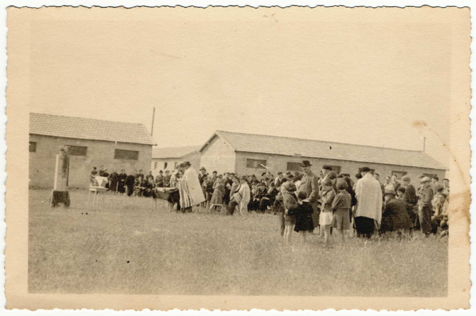 Jewish prisoners at the Rivesaltes internment camp in southern France hold an outdoor prayer service.