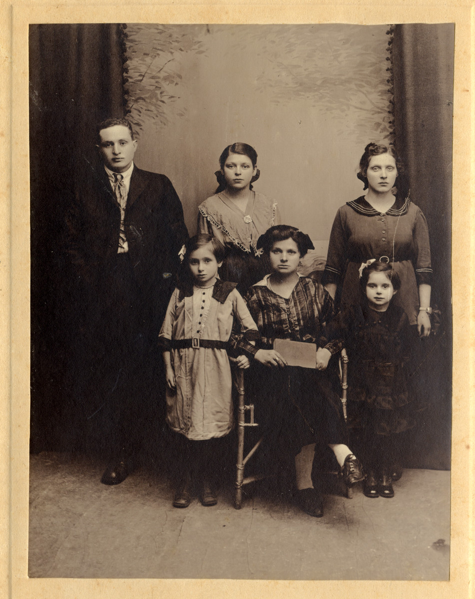 Studio portrait of the Rosenbaum family.

Pictured from left to right; in the back row are Bernard Baruch Rosenbaum, Bernice Bryna Rosenbaum (later Goldberg), and Rosa Rosenbaum (later Lopata). Front row: Frieda Altaman, Ida (Chaya) Altman) and Leah Rosenbaum.