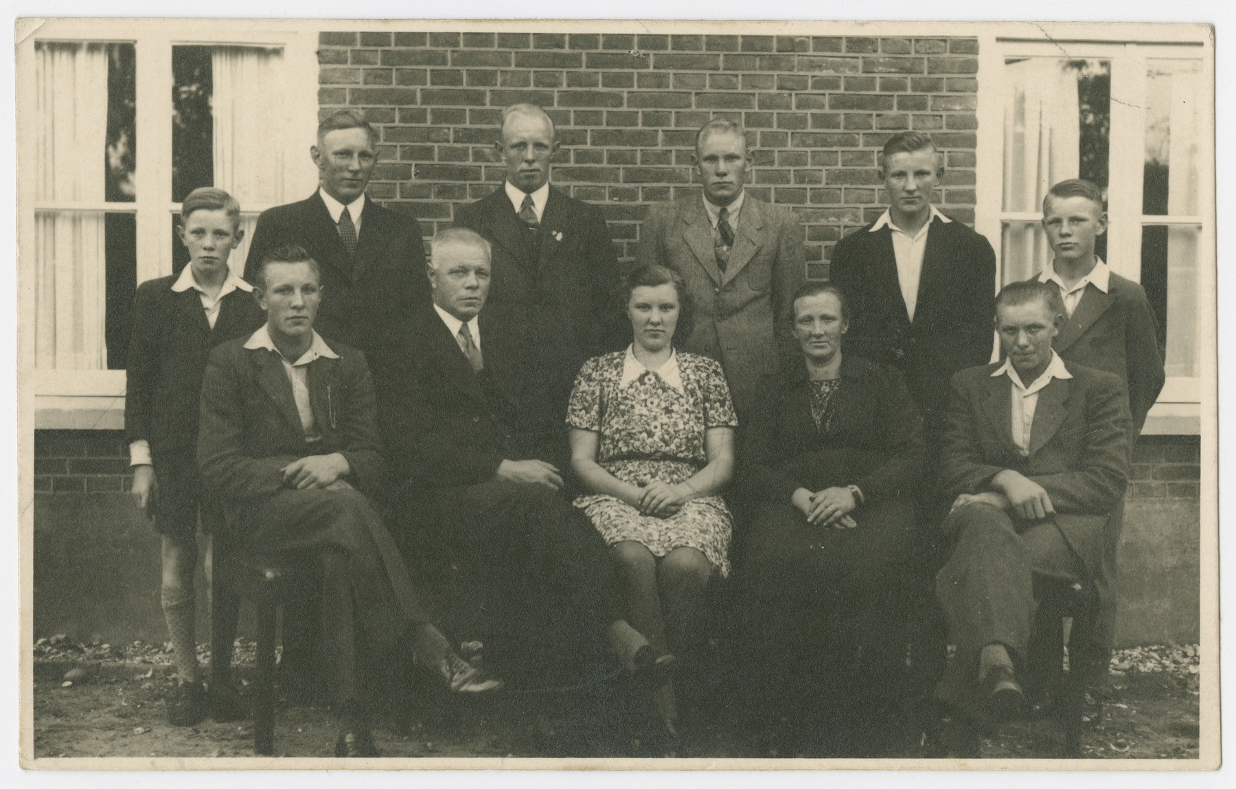 Portrait of the Korten family that hid Lennie and Yitzchak Jedwab for three months.

The Korten family hid the Jedwabs in their home and asked nothing in return. However when German solder were sent to occupy the Korten family farm the Jedwabs had to be relocated to a new hiding place. 

Standing left to right are Gerhardus Hendrikus Korten, Johan Korten, Hendrik Korten, Jan Willem Korten, Gerrit Korten, and Arend Jan Hendrikus Korten.

Seated, left to right, are Albert Korten, Johannes Bernardus Korten, Anna Korten, Johanna Geertruida Korten, and Bernard Korten.