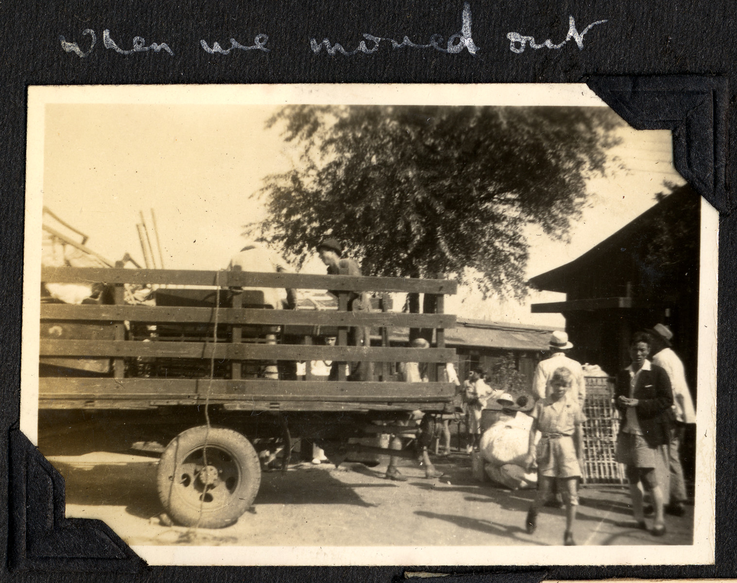 Belongings are loaded onto a truck outside the Ash Colony in Shanghai.

The original caption reads: "When we moved out."