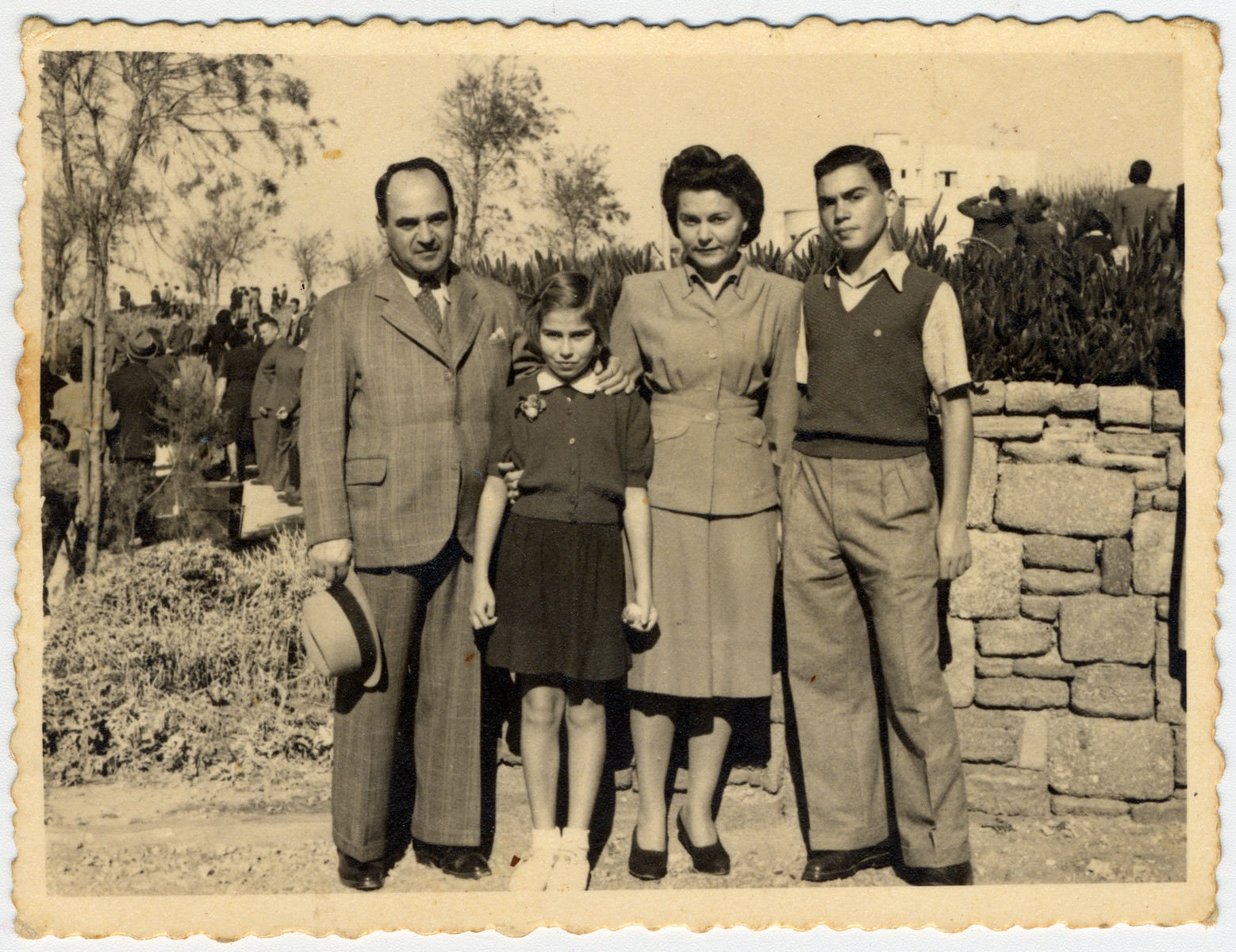 The Menn family poses by a stone wall in Tel Aviv where they settled after escaping from Lithuania.

Pictured from left to right are David, Bella, Regina and Julius Menn.