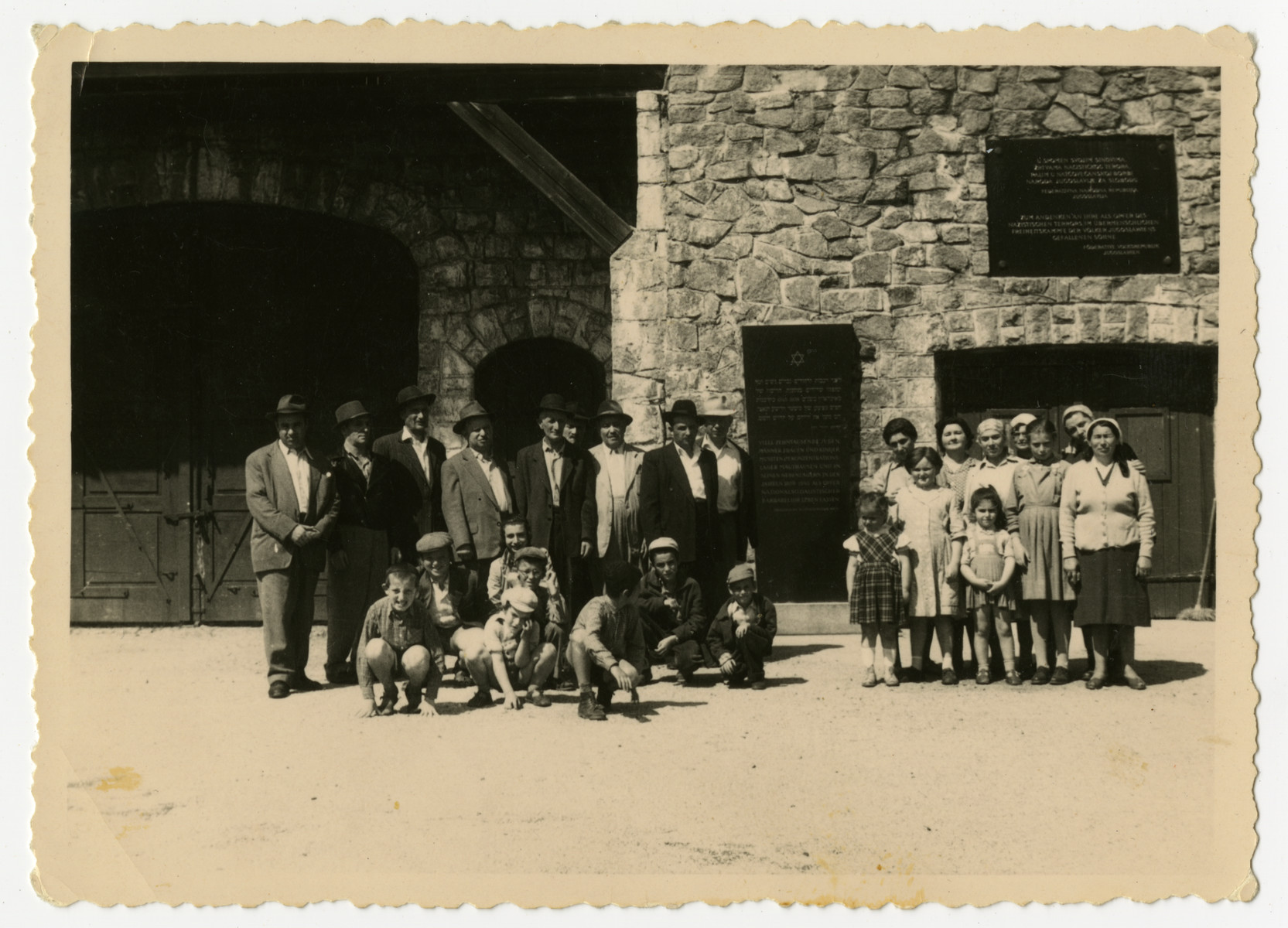 A group of Orthodox Jewish Holocaust survivors and their children visit the Mauthausen concentration camp.

They had fled to Austria from Hungary after the 1956 revolution and were living in Asten, Austria, which is between Linz and Mauthausen.