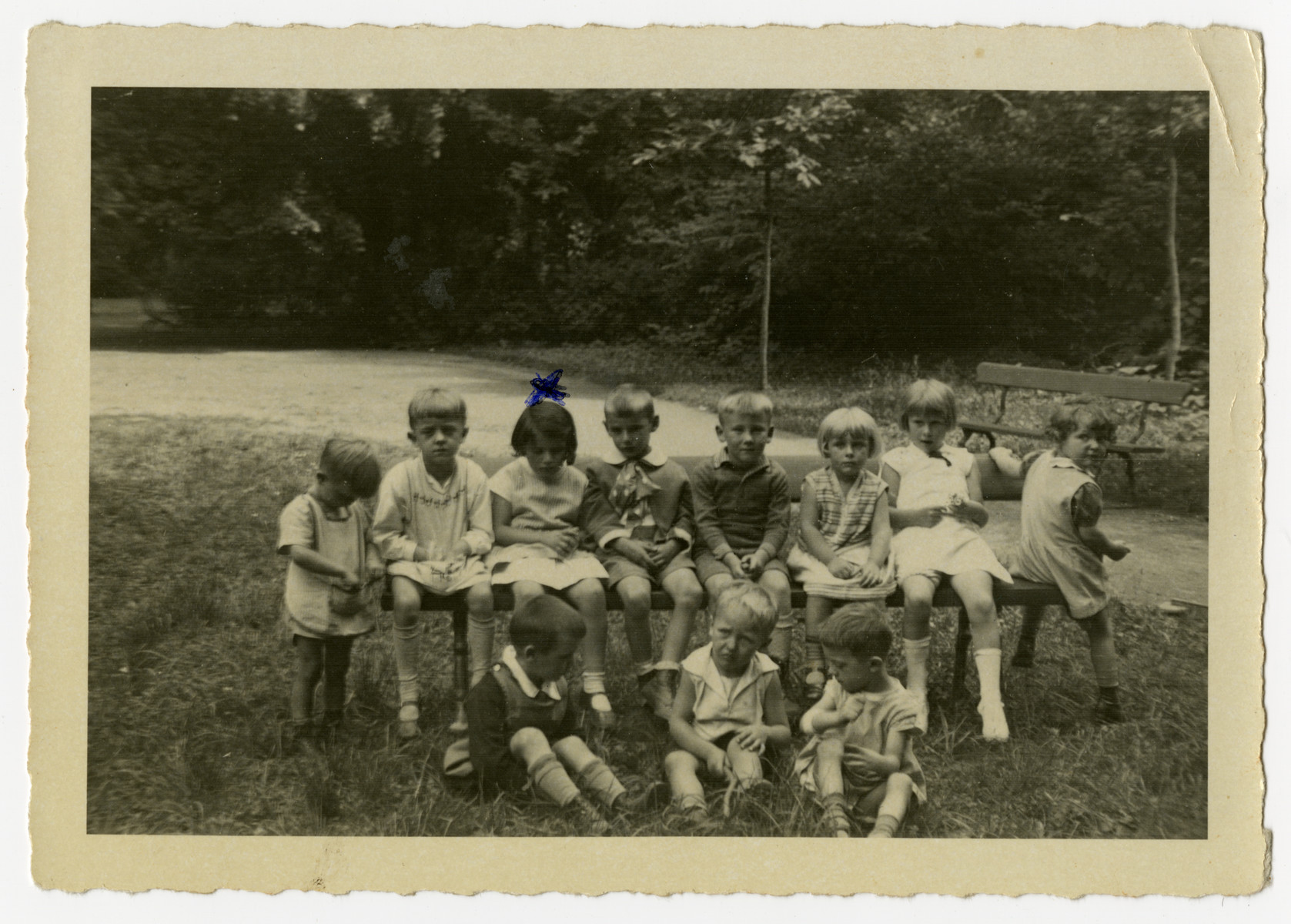 Group portrait of young children in a Catholic kindergarten in Marienberg.

Hilde Loeb, a Jewish child, is pictured seated third from the left.