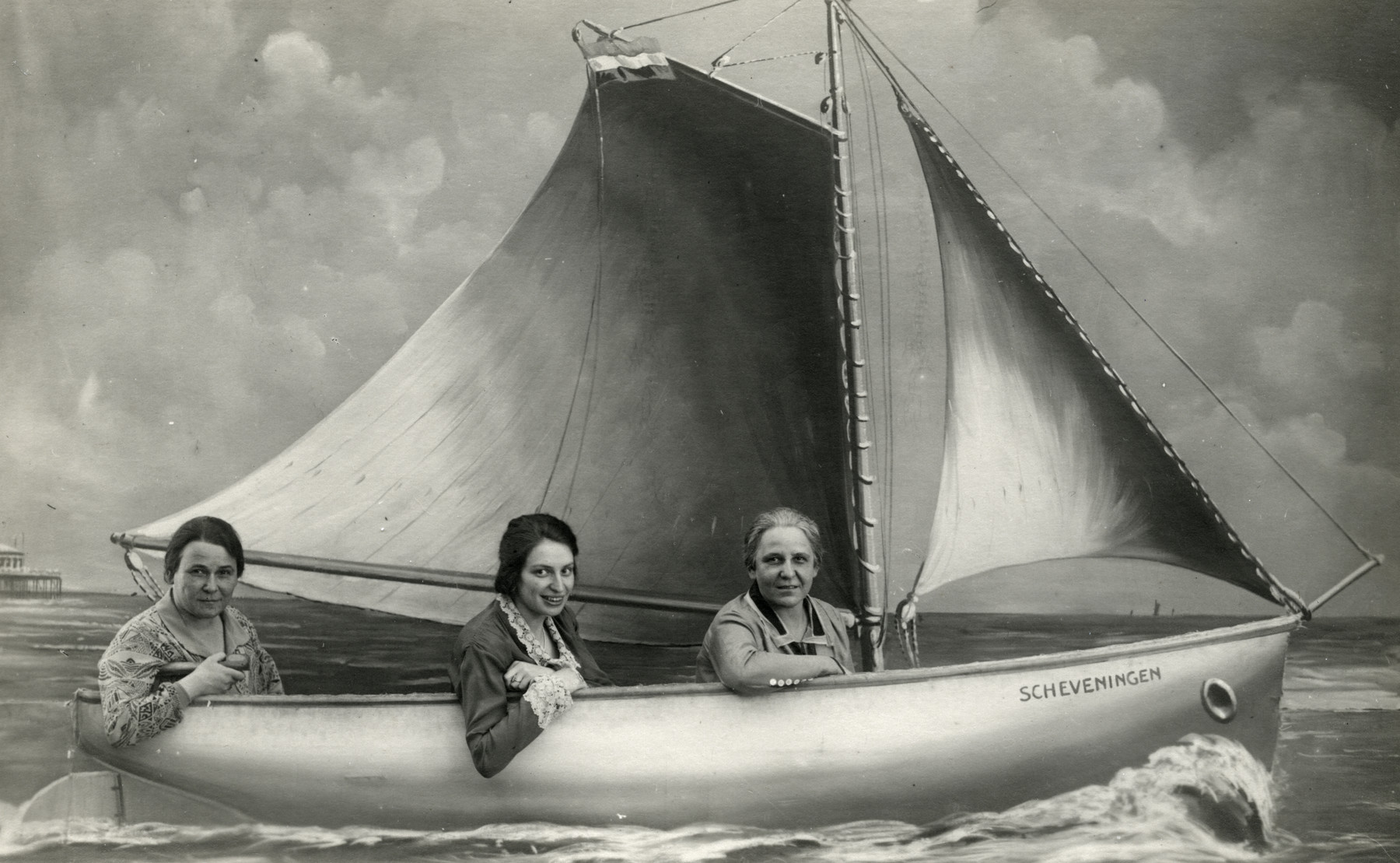 Studio portrait of three sisters on a pretend boat in Scheveningen, Holland.

Lotte van Collem Randerath is in the center.