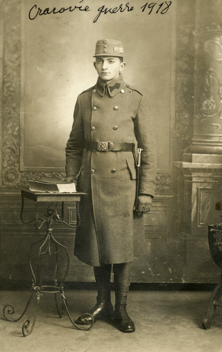 Studio portrait of Eduard Spira, a Jewish soldier in the Polish army.