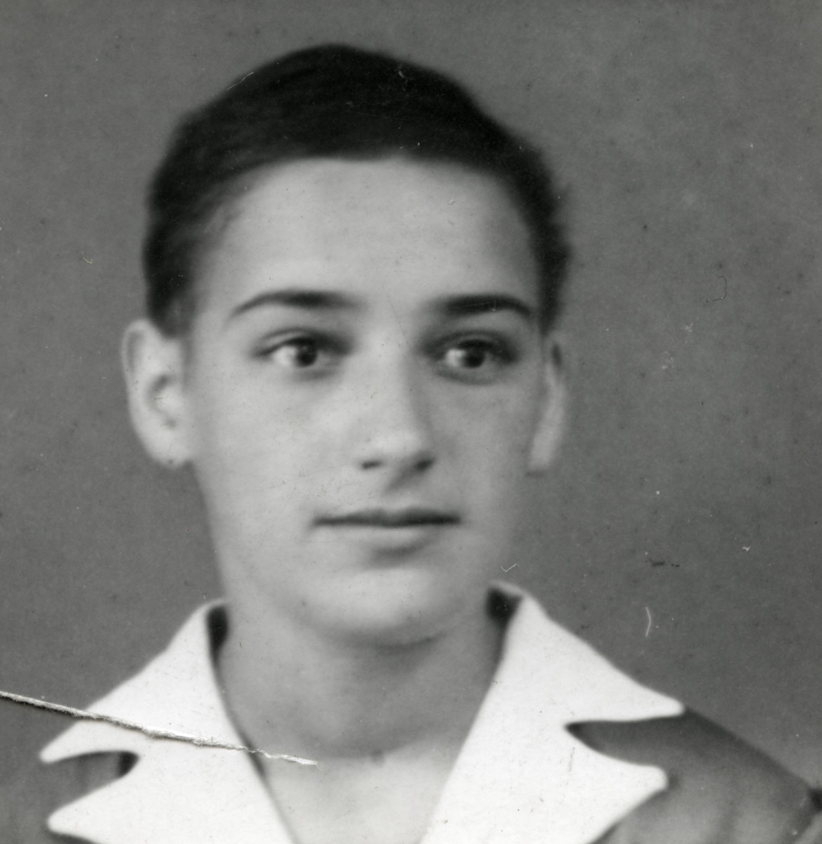 Studio portrait of Marta van Collem shortly after her liberation from the "Lost Train."  Her hair had not yet grown back.