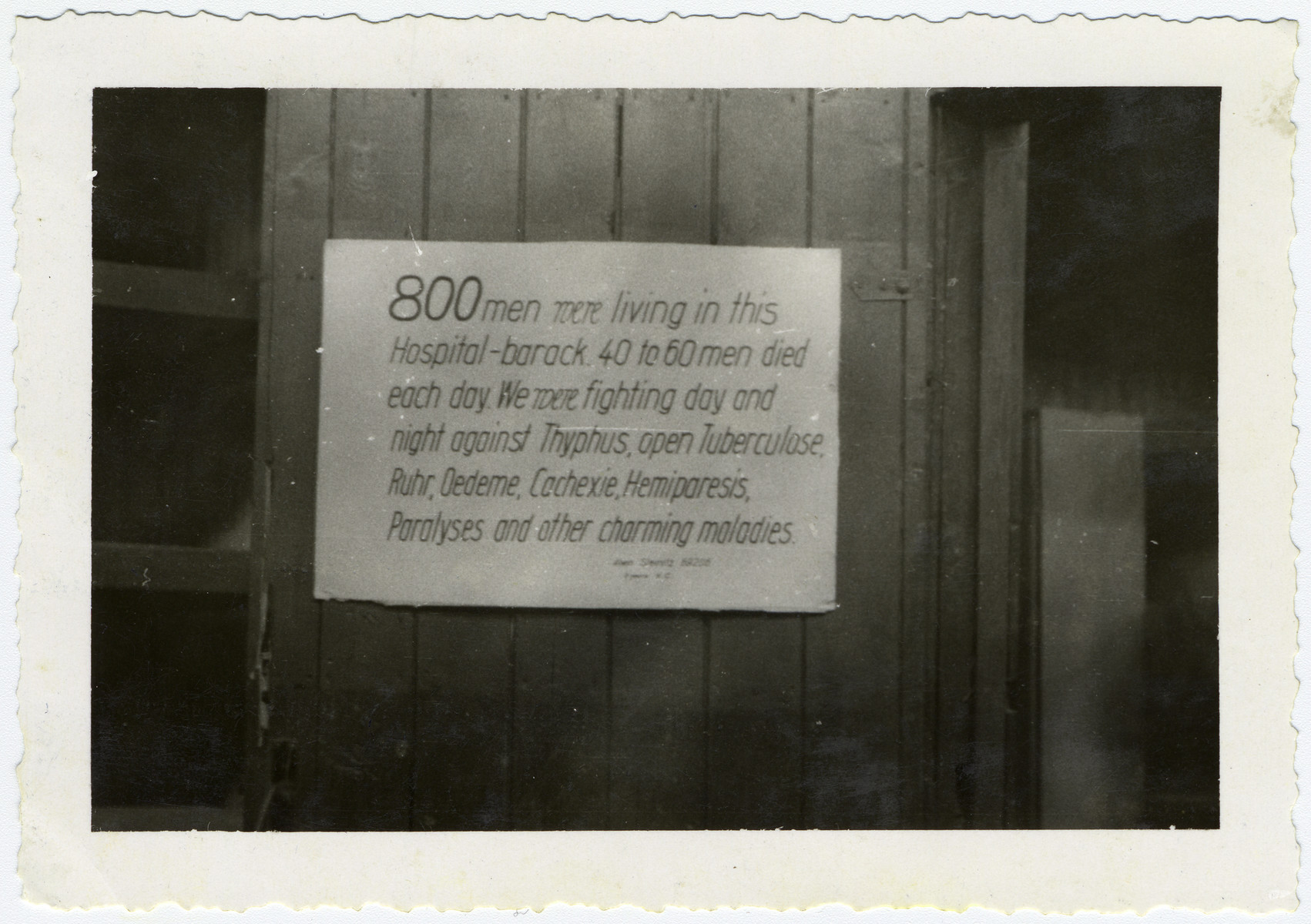A sign on a the hospital barrack at Buchenwald honors the victims of disease and maltreatment.  

It reads, "800 men were livng in this Hospital-barrack.  40 to 60 men died each day.  We were fighting day and night against Typhus, open Tuberculase, Ruhr, Odeme, Cachexie, Hemiparesis, Paralyses and other charming maladies."