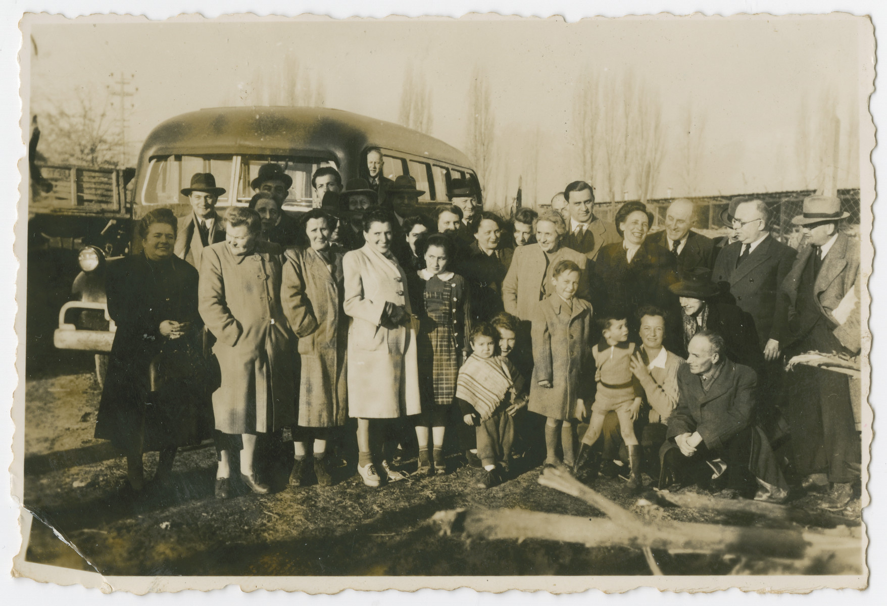 Photograph from an album entitled, "Hacshara Kidma Chile,"  documenting life on a postwar Zionist agricultural collective in Chile.

Group photo of the parents of the first group of Hachshara members.  The inscription on the album page (in Spanish) reads, "The first Jalutzim and their parents."