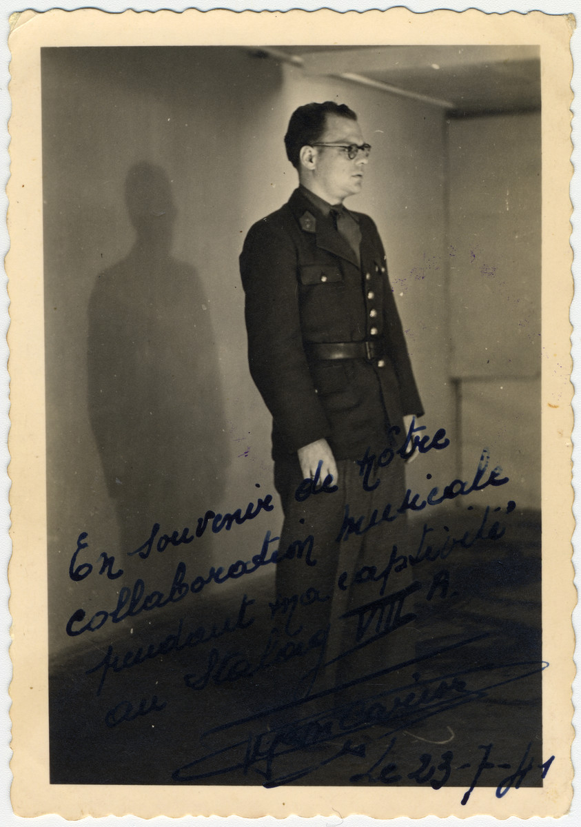Close-up portrait of Fernand Carion, a Belgian musician and prisoner-of-war.  He conducted the prisoner's orchestra in Stalag VIII-A.

The original caption reads "As a memory of our musical collaboration during our custody in Stalag VIIIA."