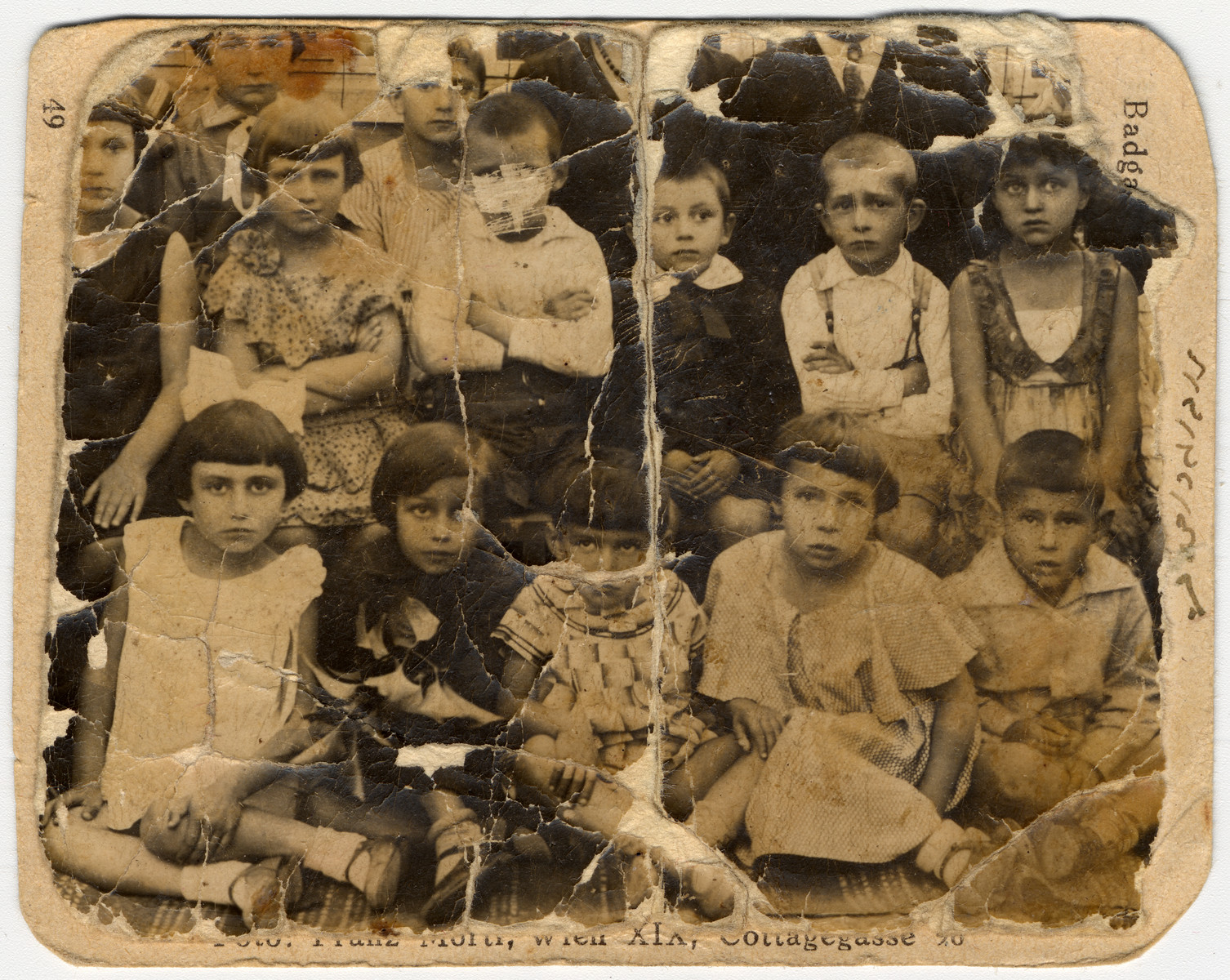 Group portrait of young children in a Jewish school in Nowogrodek.

Esther Ass is pictured in the front row, second from the left.