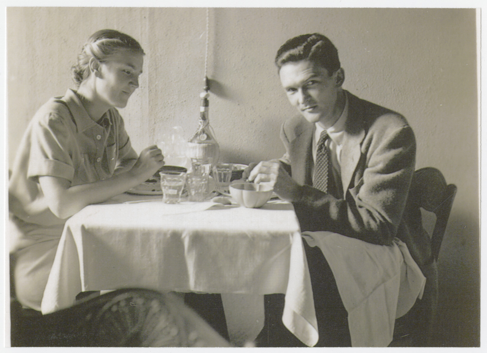 Roswell and Marjorie McClelland sit for a meal in Rome where they were opening an American Friends Service Committee Office.