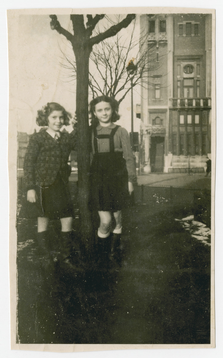 Fanny Fogel poses next to a tree with a friend while in hiding in Lille.