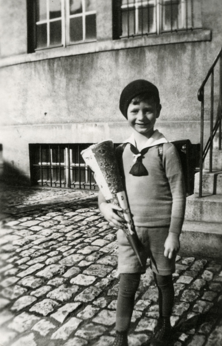 Werner Loebl holds a cone of goodies on his first day of school.