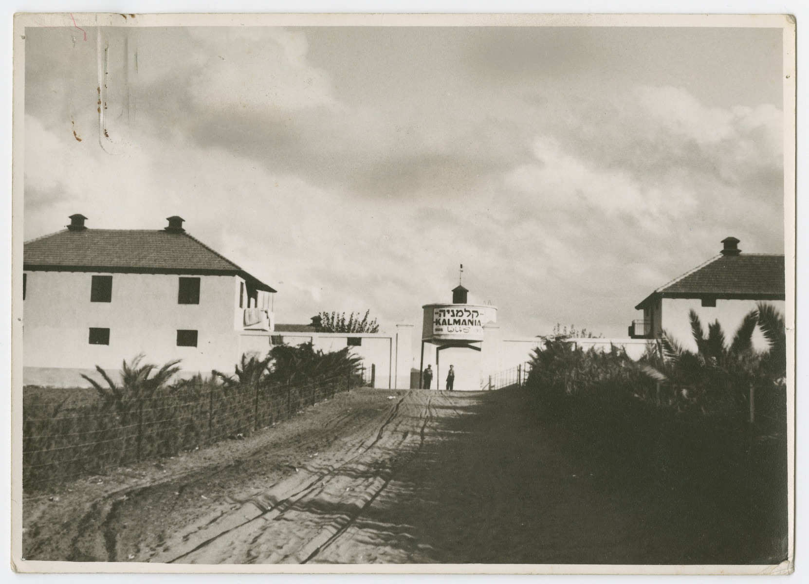 View of the Jewish settlement of Kalmania.

Photograph is used on page 240 of Robert Gessner's "Some of My Best Friends are Jews." The pencil inscription on the back of the photograph reads, "Homes built as Forts as protection."