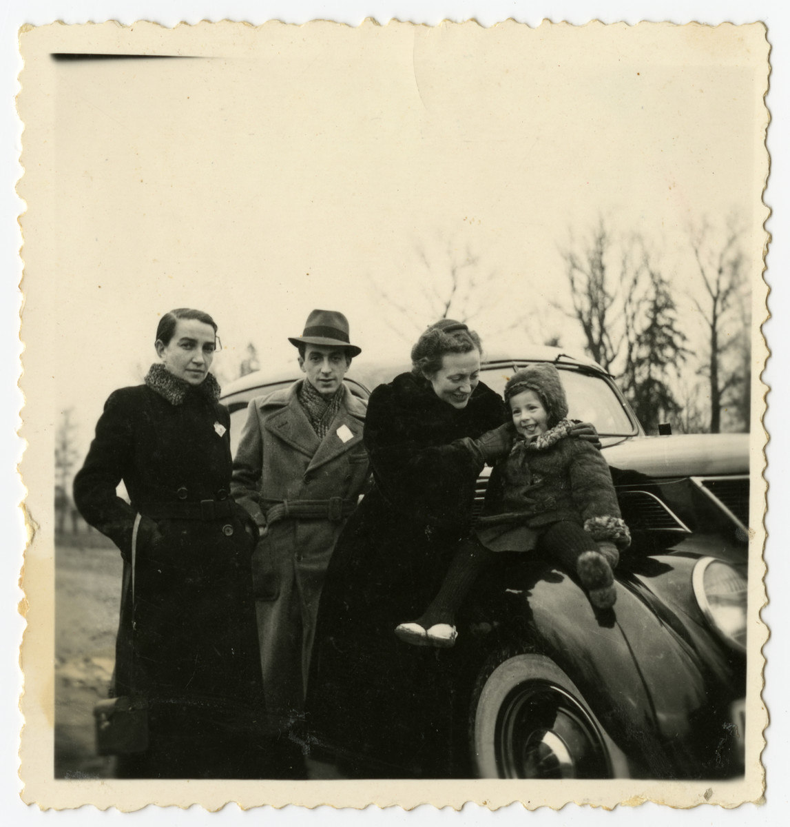 Rosian Bagriansky sits on top of her father's Ford next to her mother and family friends.

Gerta Bagriansky is pictured second from the right next to her daughter Rosian.  Rivka Smukler Osherovitz is on the far left.