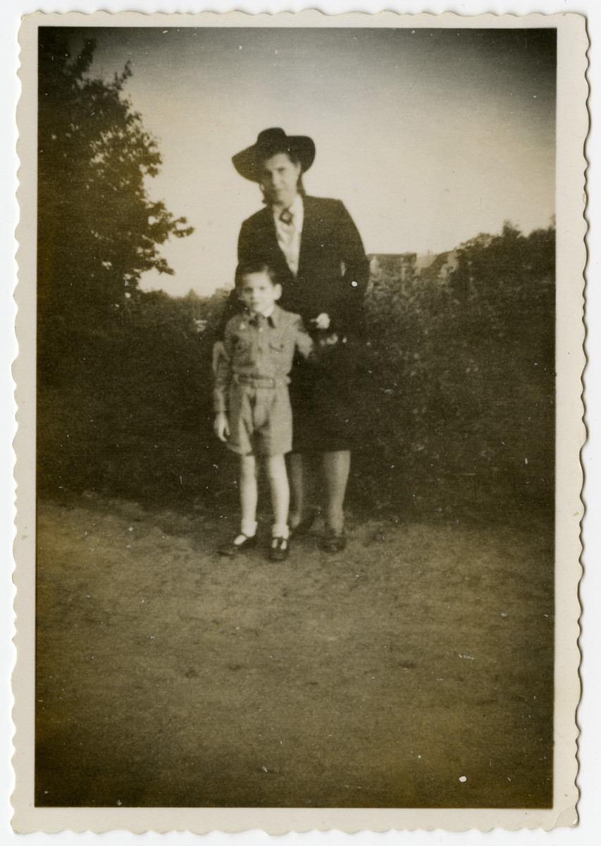 Harry Markowicz stands outside next to Adele Vanderlinden, his rescuer.