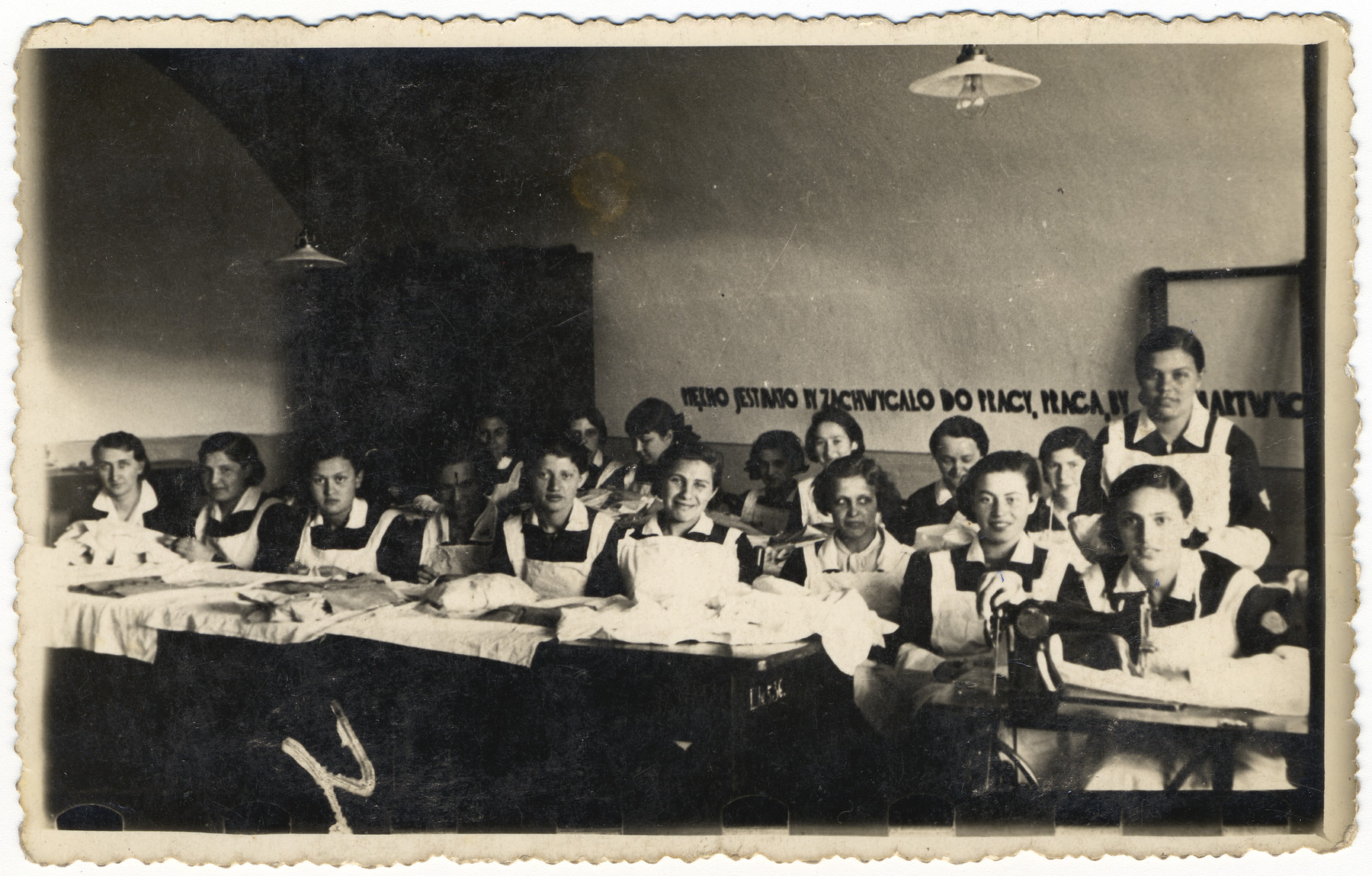 High school class photograph of young women in Zamosc, Poland.

Among those pictured is Pola Greiner.