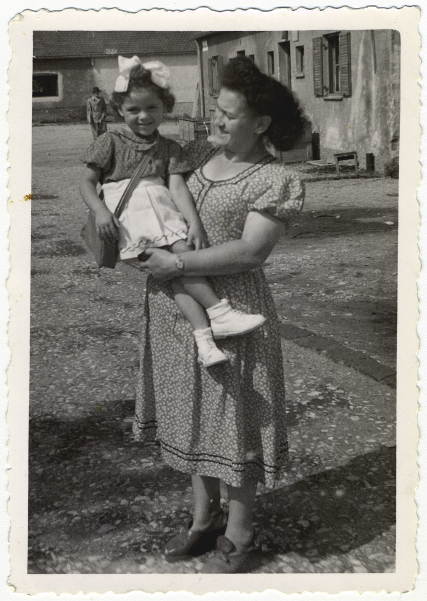 Pola Zawierucha holds her young daughter, Regina, in the Fohrenwald displaced persons camp.