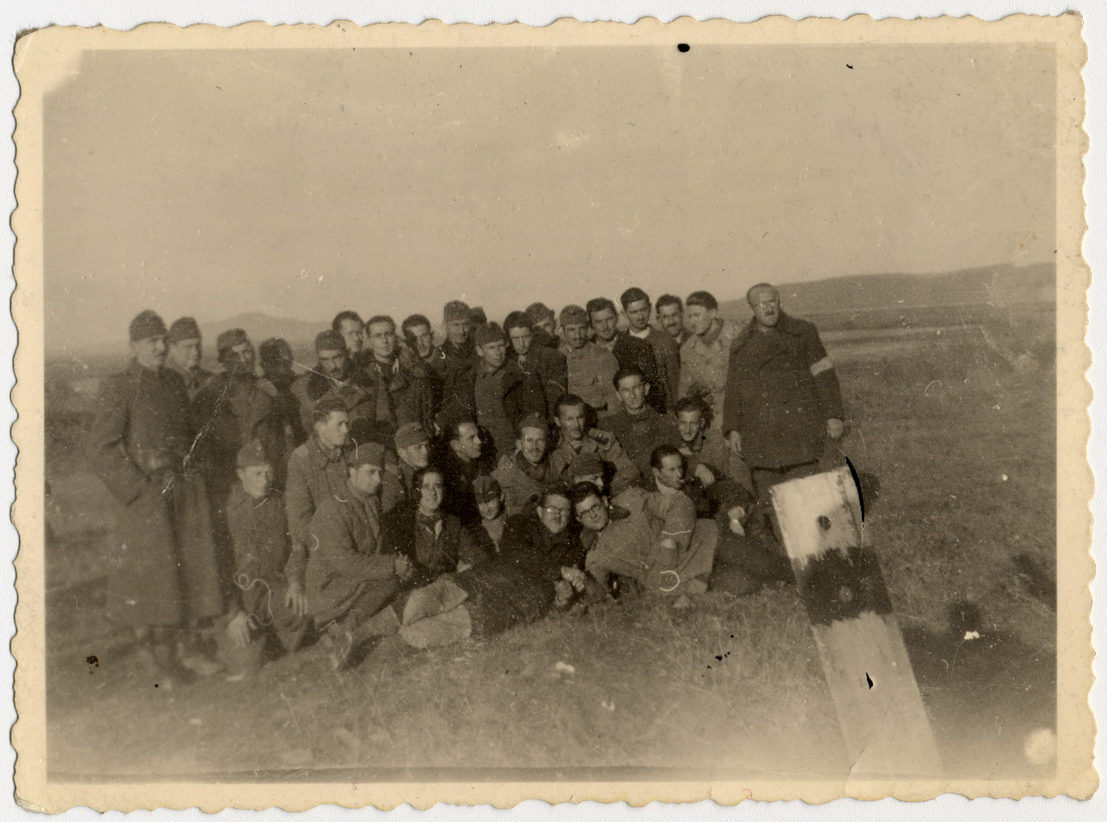 Group portrait of Hungarian Jews in a forced labor battalion.

Among those pictured is Geza Kovacs.