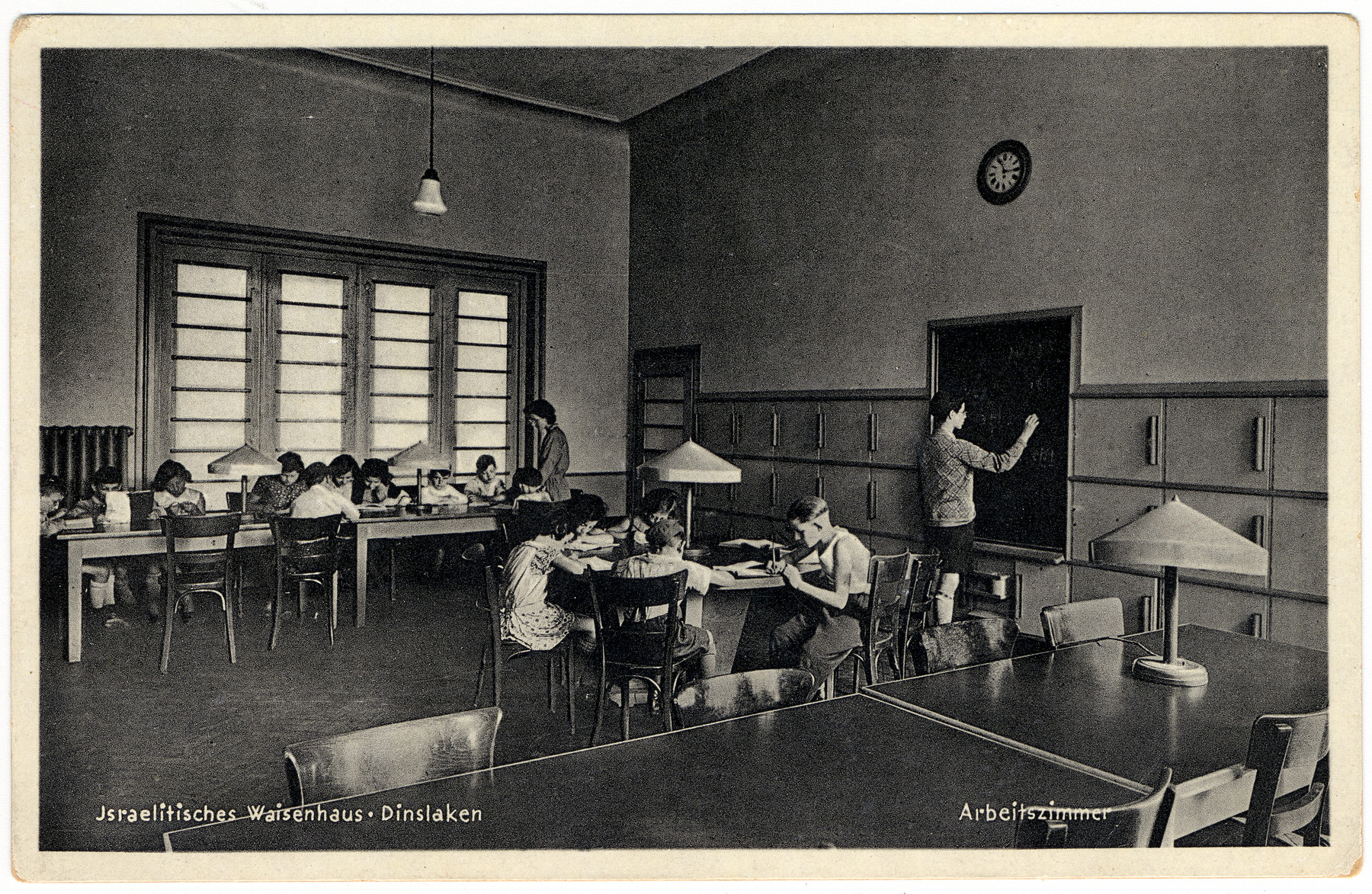 Children study in the classroom of the Waisenhaus of the Dinslaken Jewish orphanage.