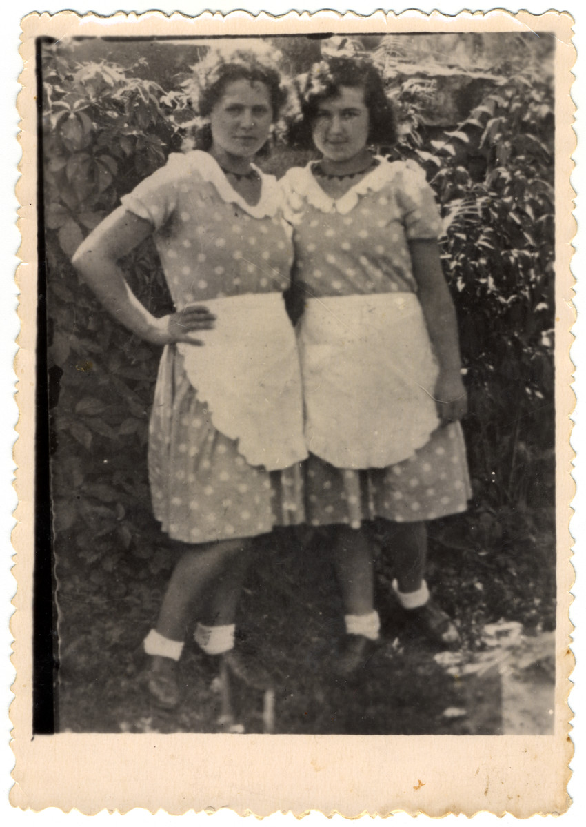Close-up portrait of two young women in matching dresses.

Pictured on the right is Piri Virtgaym who perished in the Holocaust.