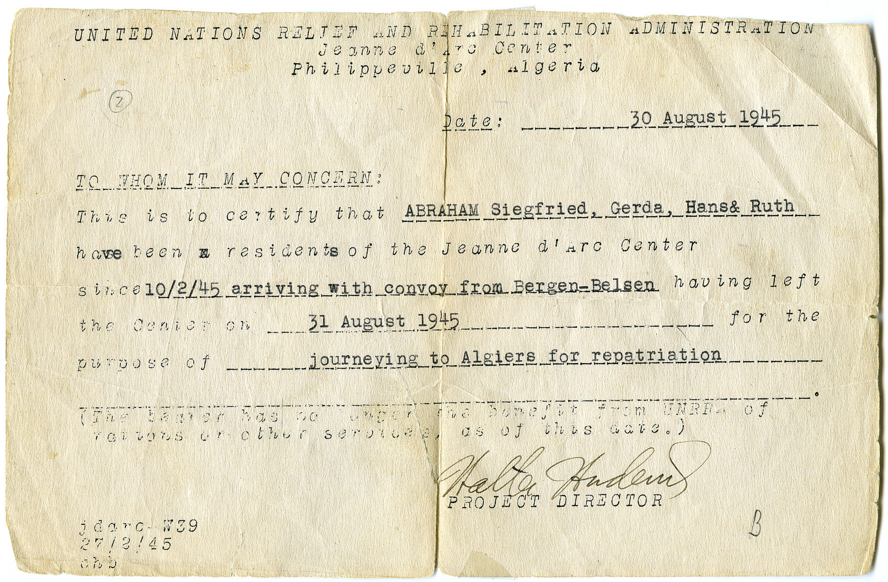 UNRRA card issued to the Abraham family stating they had arrived in the Philippeville camp following their release from Bergen-Belsen and were now journying to Algiers for repatriation.