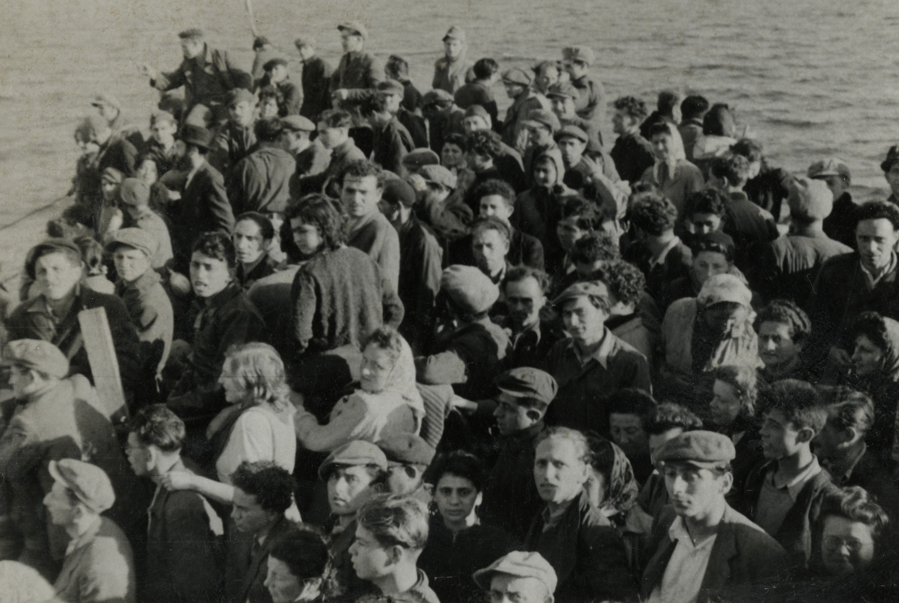 Illegal immigrants crowd together on the deck of the ship, Hatikvah.