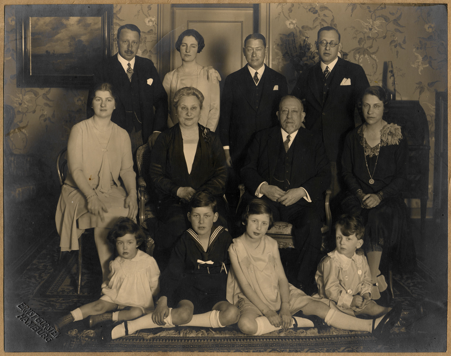 Family portrait taken on the occasion of the 70th birthday of Leo Stern.

Pictured: (back row):  Ernest Bing, Ilse Stern , Otto Stern, Walter Stern; (middle row): Charlotte Stern, Bella Stern, Leo Stern, Erna Stern Bing; (bottom row): Ellen Stern Overton, John Bing, Ann Bing Halstead, and John Stern.