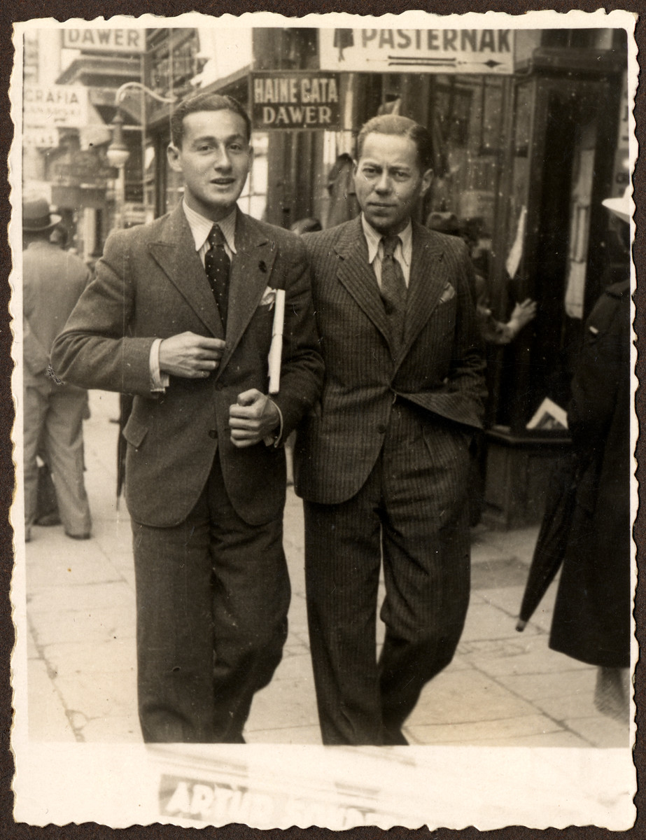 Two men walk down a street in prewar Cernauti.

Paul Grossman is pictured on the left, man on right was Ella Grossman's first husband, name not known.