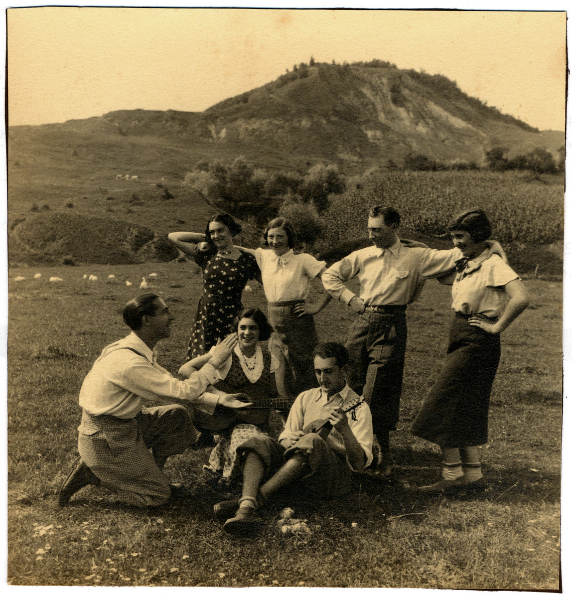 Romanian Jewish youth sing and dance to a mandolin in the Romanian countryside.

Among those pictured are (seated left to right): Siegmund Segal, Miraim Segal (unidentified). Standing: Adolf Fortes and Anna Segal (Grossman).