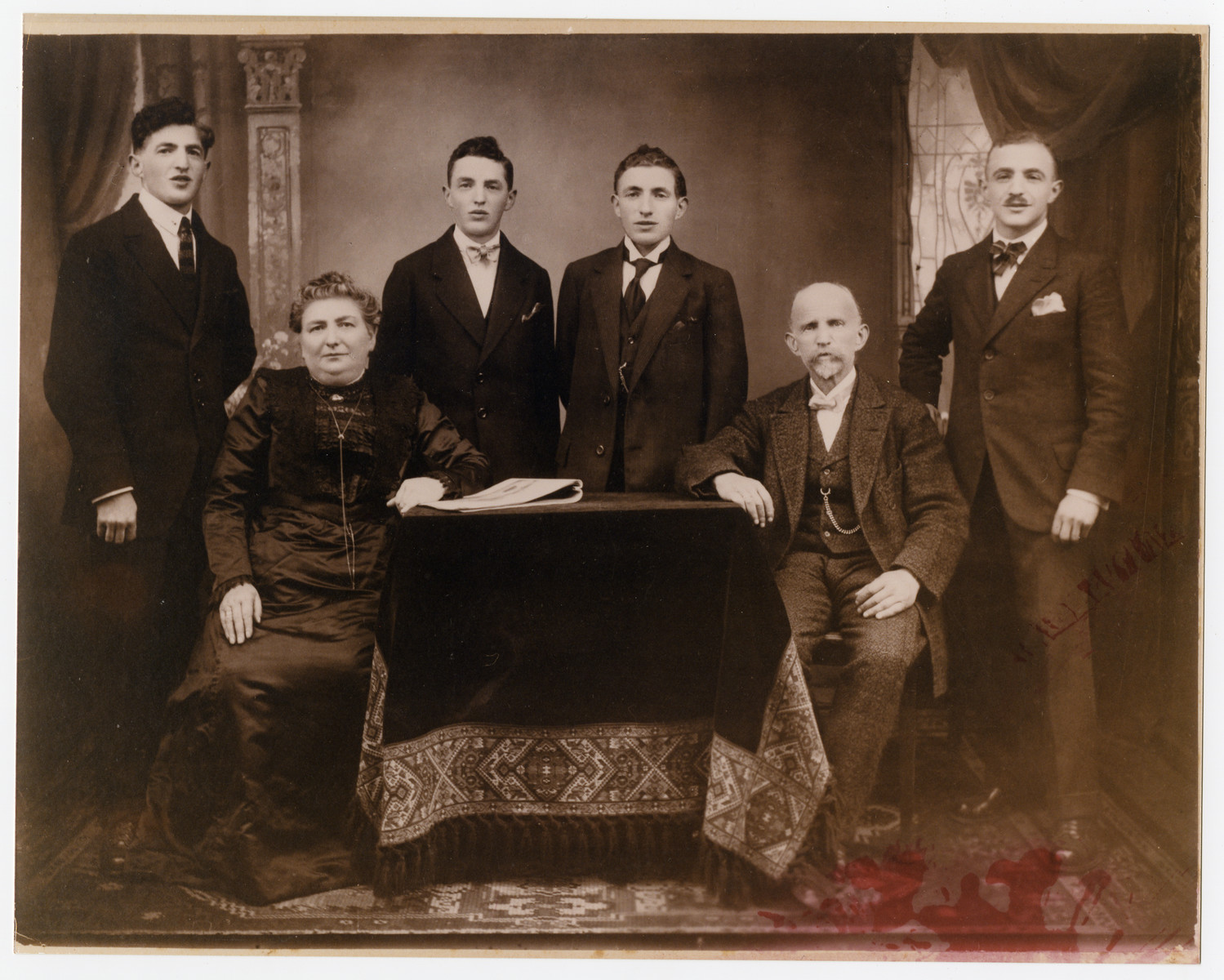 Studio portrait of the Zimmern family in Walldurn, Germany.

Seated are Bertha and Harold Zimmern.  Behind them are their four sons.  Julius (who immigrated to the United States before the Holocaust) is on the far left.  David (the father of the donor) is on the far right.  In the middle are Hugo and Leopold.