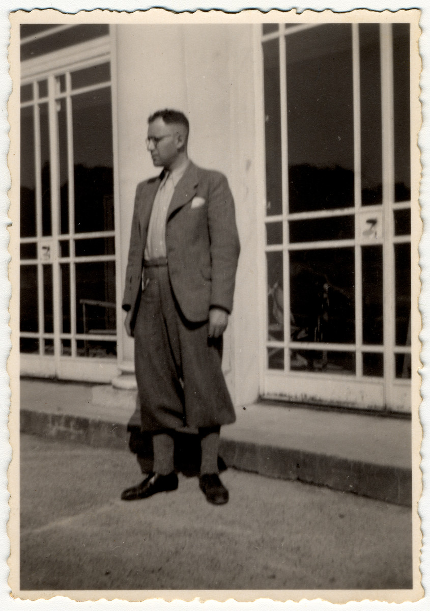 Portrait of Herbert Hoexter standing on the Strand promenade in Ramsgate not far from the Kitchener refugee camp.