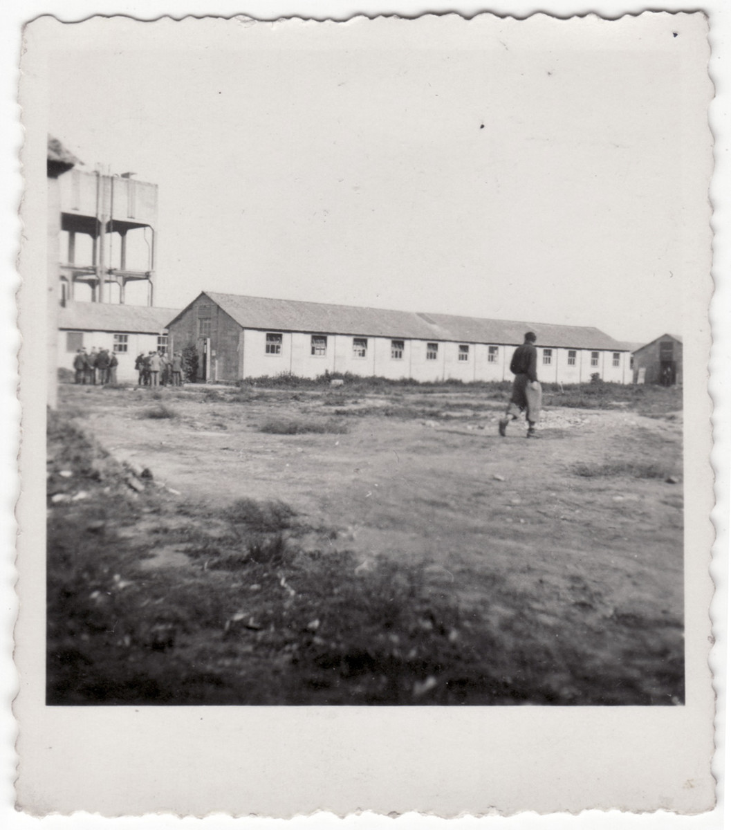 A Jewish refugee walks on the grounds of the Kitchener refugee camp.