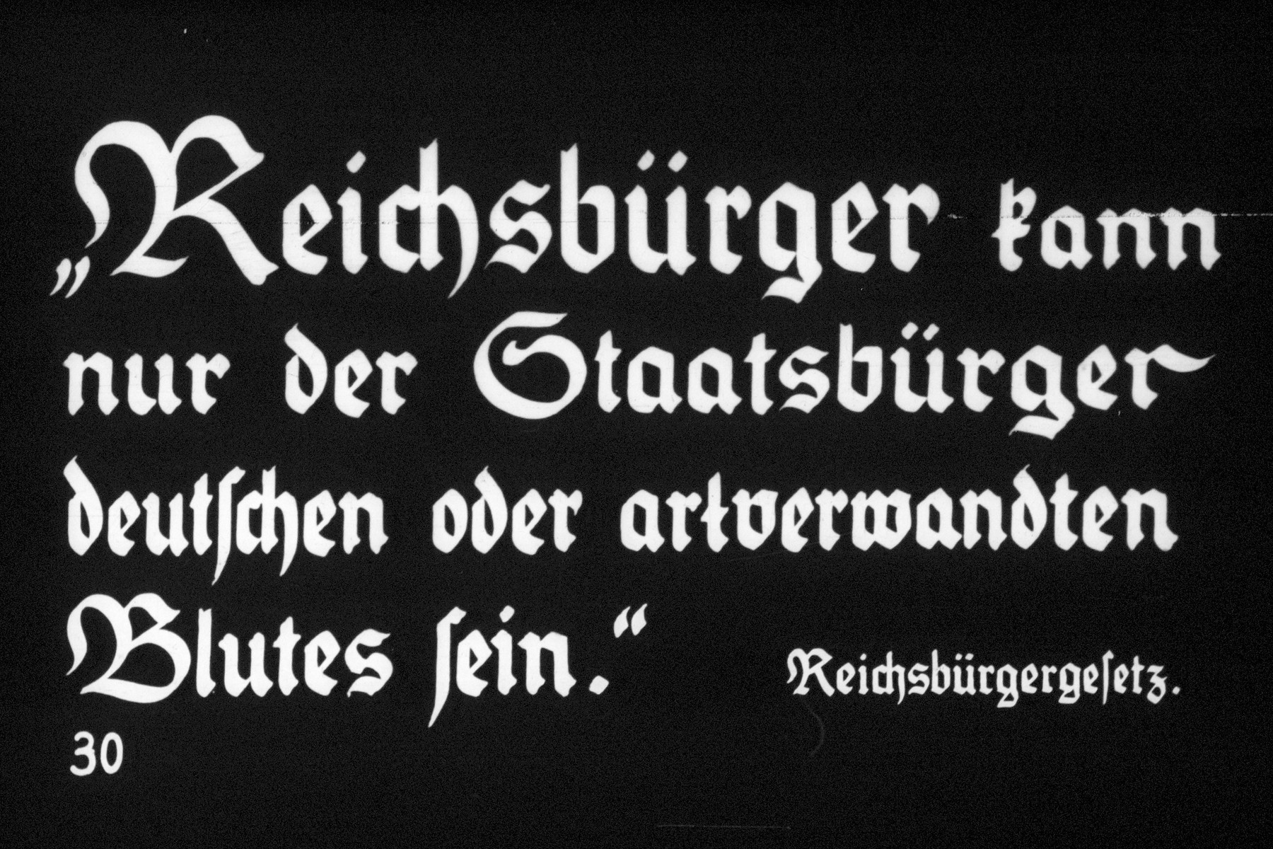 30th Nazi propaganda slide of a Hitler Youth educational presentation entitled "Germany Overcomes Jewry."

"Reichsbürger kann nur der Staatsburger oder artverwandten Blutes"
//
"Reich citizens can only have German or Aryan blood"