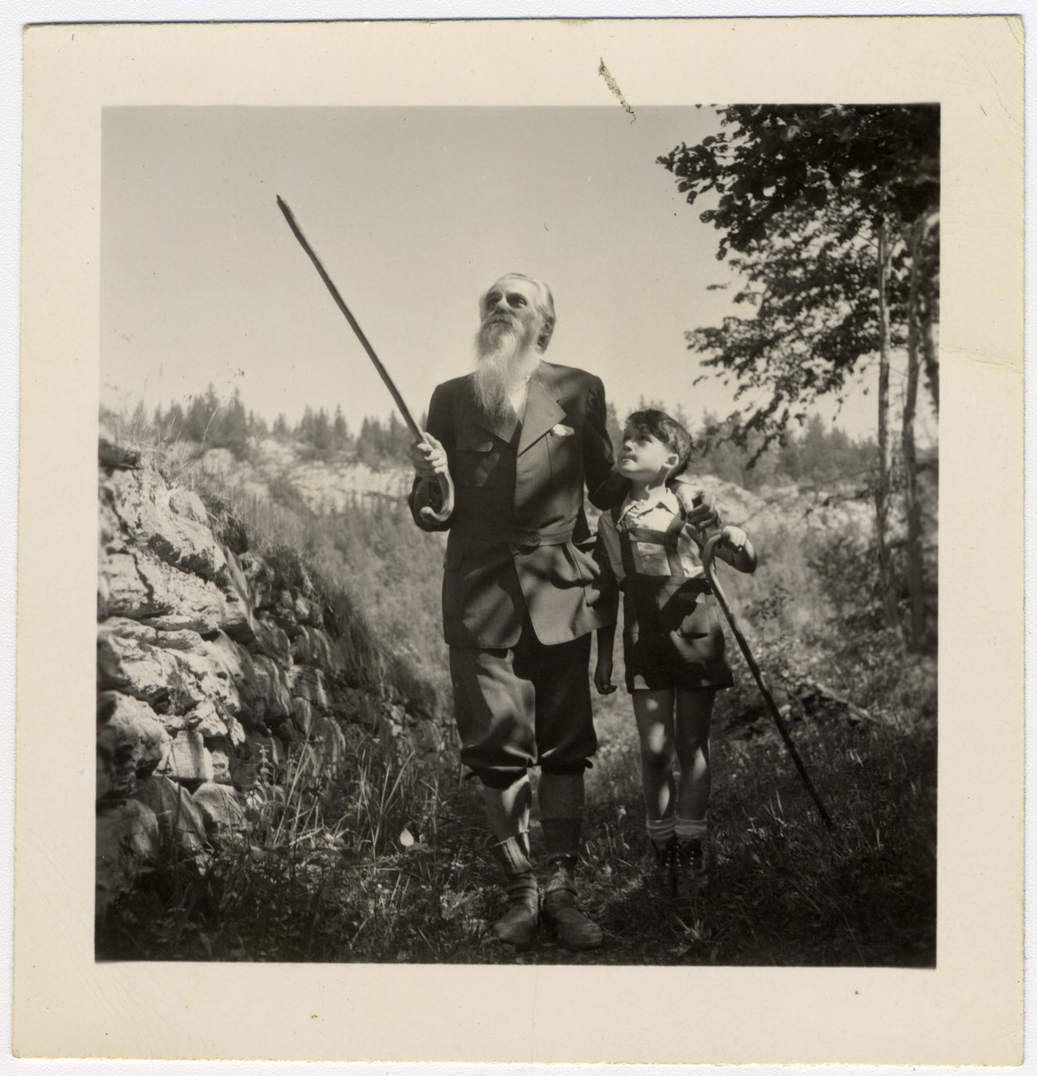 Dr. Geheb, the principal of the private school, École d'Humanité near Bern, goes for a walk with a young student.

Ruth Schwarzhaupt attended this school for about a year.