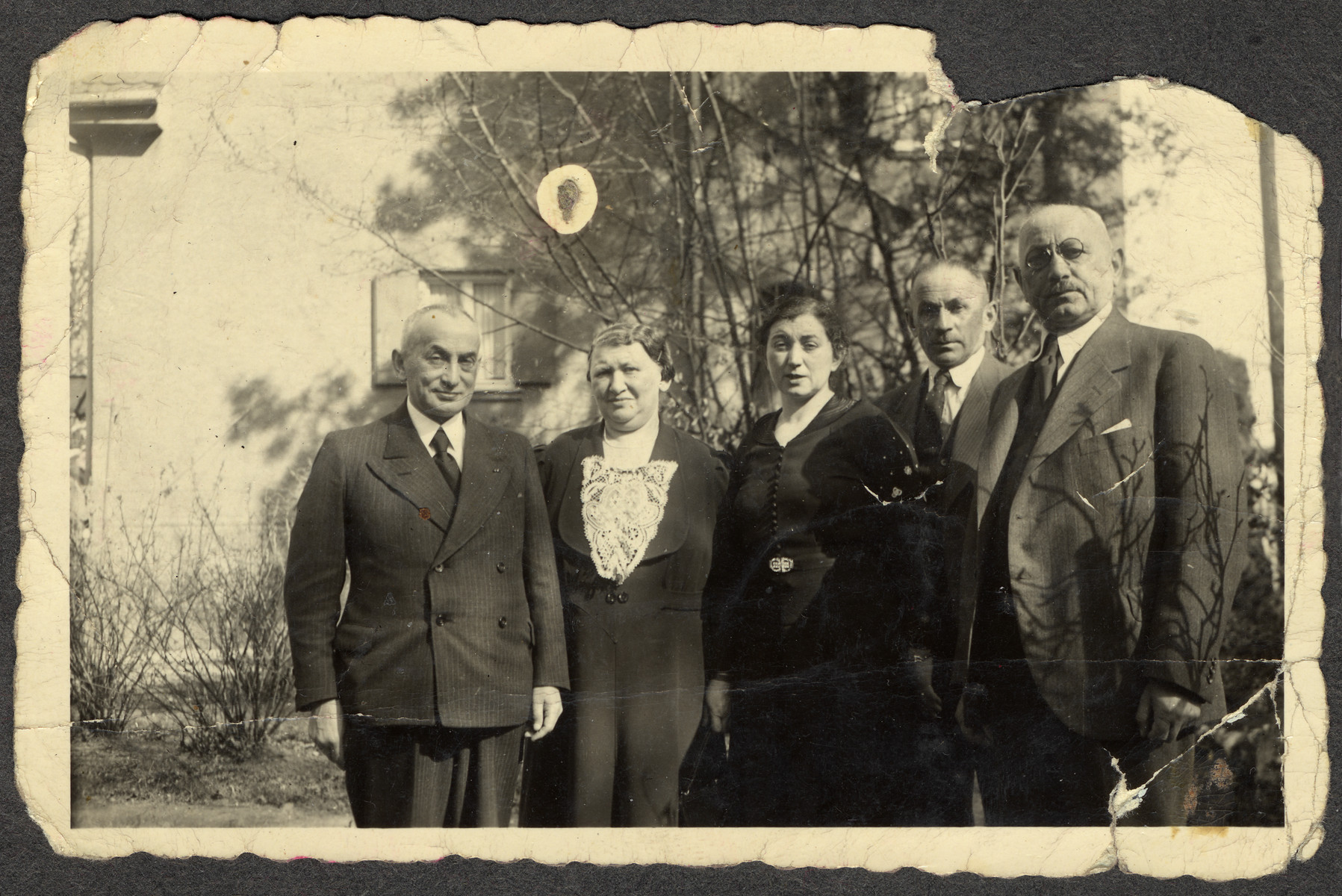 The Hirschfeld and Einstein families pose for a photograph.  

Pictured are Ellen Seligman's maternal grandparents, the parents of her cousin Liesel Fischer, and an uncle.  The grandparents immigrated to the United States, but members of the Einstein family perished in the Holocaust.