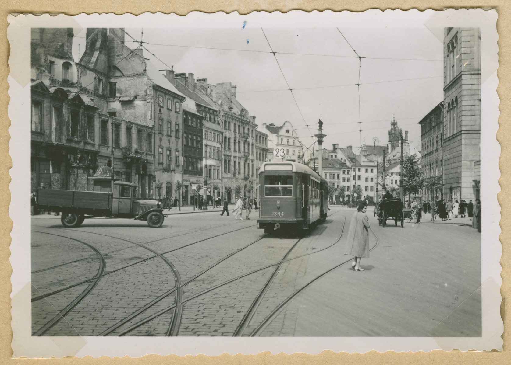 A streetcar on Krakowskie Przedmiescie in Warsaw.

The Krakowskie Przedmiescie is one of the oldest  and most prominent avenues in Warsaw, surrounded by historic palaces, churches, and manor houses.  Zygmunt's Column is visible near the center of the photograph.