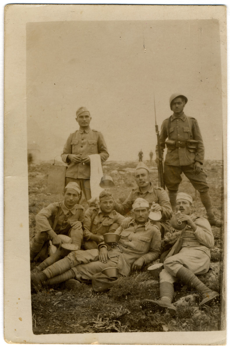 A group of Greek soldiers poses for a photograph.

Among those pictured is Jacob Elhai.
