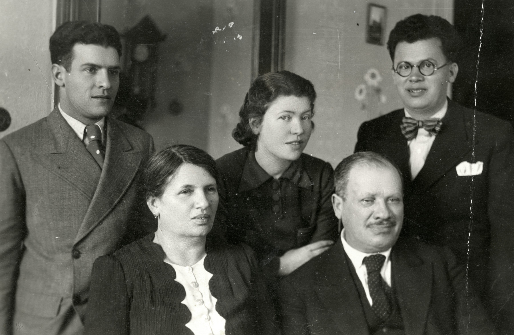 Portrait of the Hajon family prior to Mordechai's immigration to Palestine. 

Top row (left to right): Mordechai (Marko) Hajon, Tina Hajon; and Joseph (Beppo) Hajon, the donor's uncle who perished at the Jasenovac concentration camp. Bottom row (left to right): Esther and Izak Hajon, the donor's grandparents.
