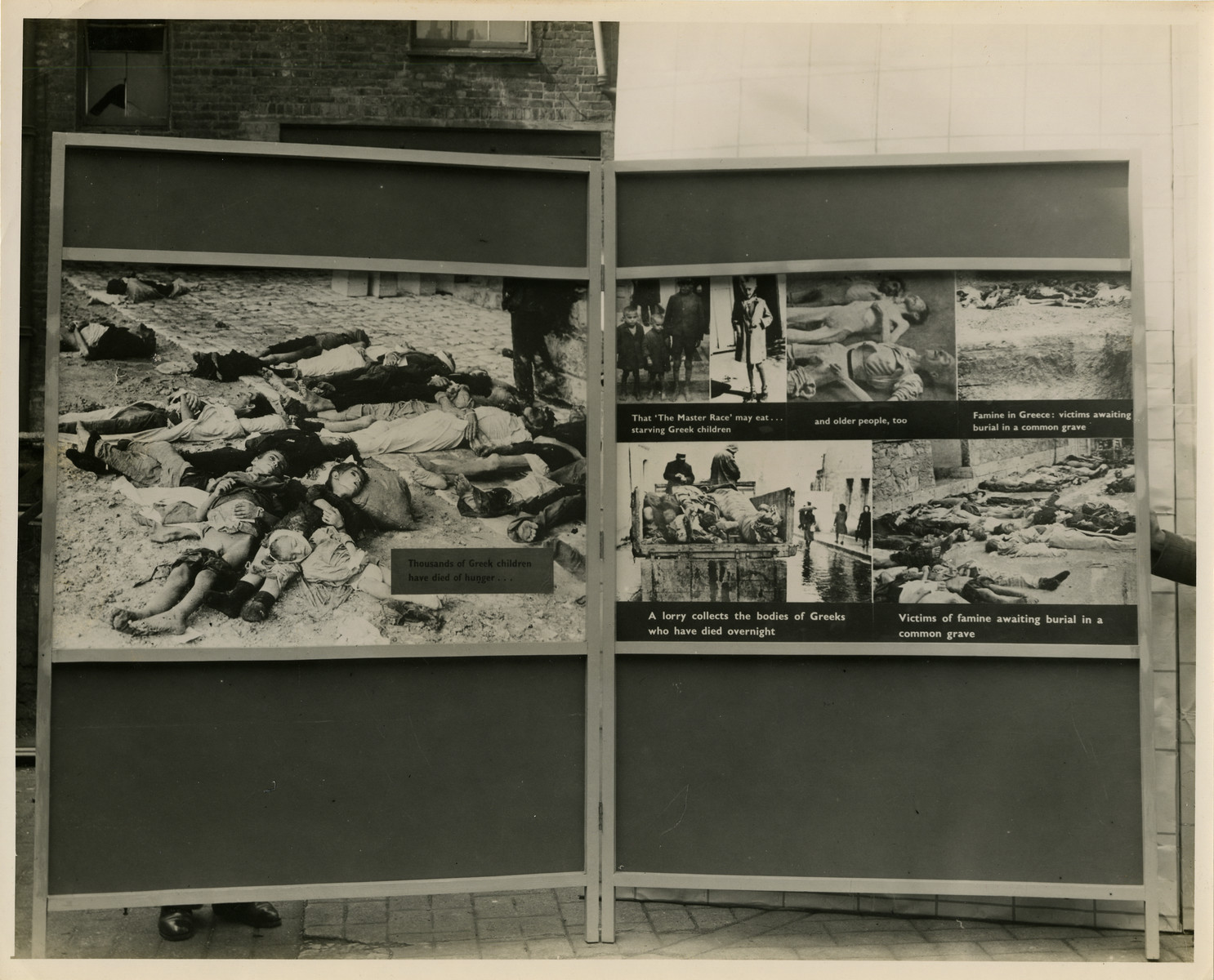 Panel from a 1944 exhibition in London, England, entitled "Germany- the Evidence" showing Greek victims of the Nazi Regime. 

The panel shows pictures of emaciated Greek victims, both young and old, who died due to famine. 

The back of the photo reads "British Official Photograph; Distrbuted by the Ministry of Information. D. ; The Evil We Fight.; Ministry of Information Exhibition priduced by Display &Exhibitions Division for show all over Great Britain.; Display panel"