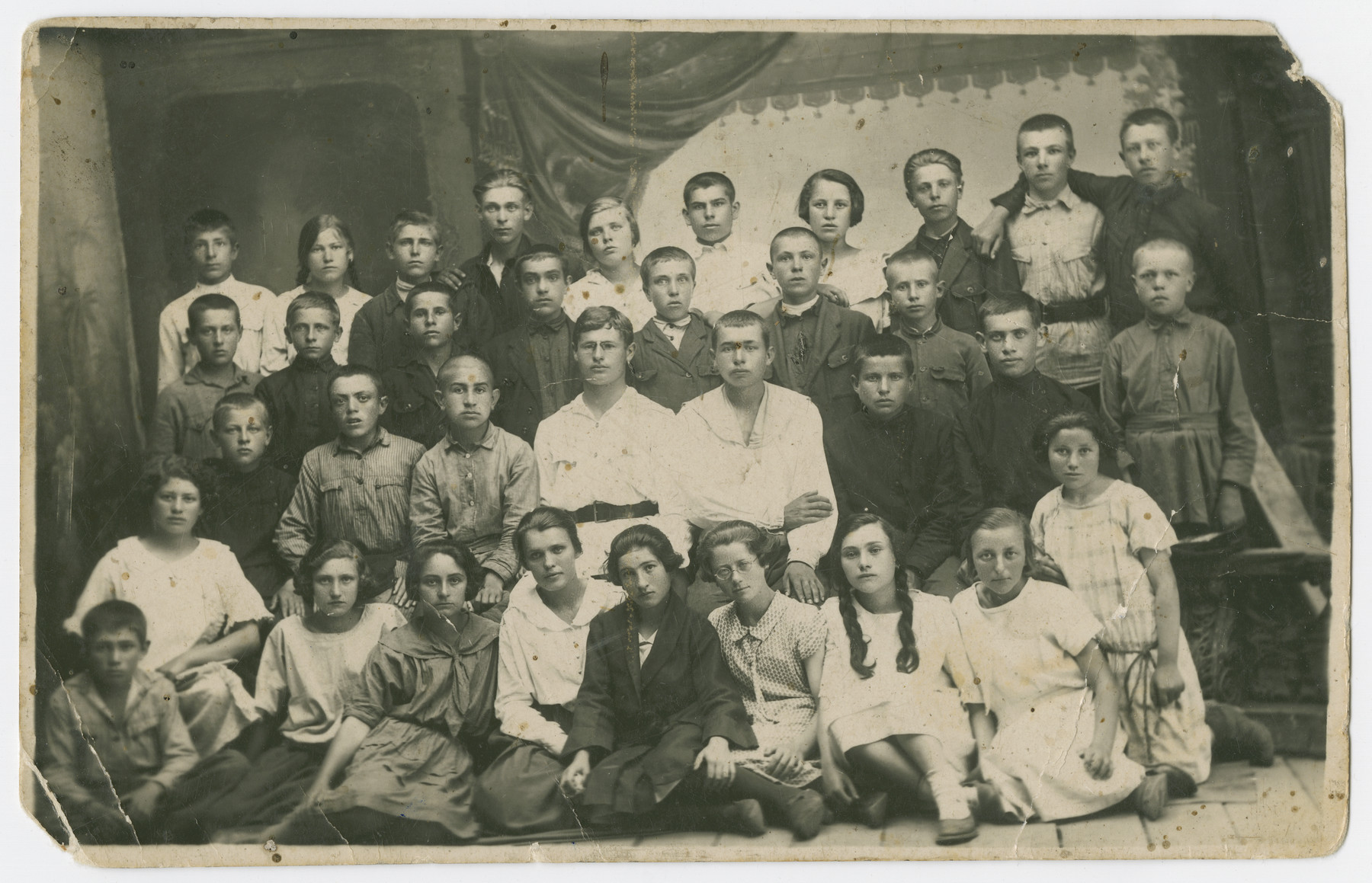 Group portrait of Jewish youth in Orinin, Ukraine.

Among those pictured is Mania Lechtman, who was one of the few survivors.