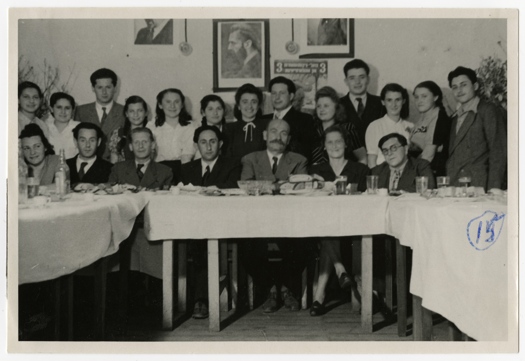 Group portrait of the teaching staff and some of the students of the Zeilsheim High School.

Among those pictured is Solomon Manischewitz, seated, second from the left, and Mr. Epstein, the principal, seated in the center.